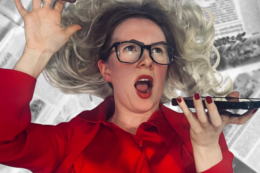 A woman in bright red shirt is shouting into a phone she is holding