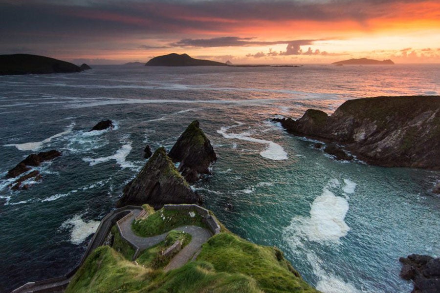 The rocky coastline of the Dingle Peninsula at sunset