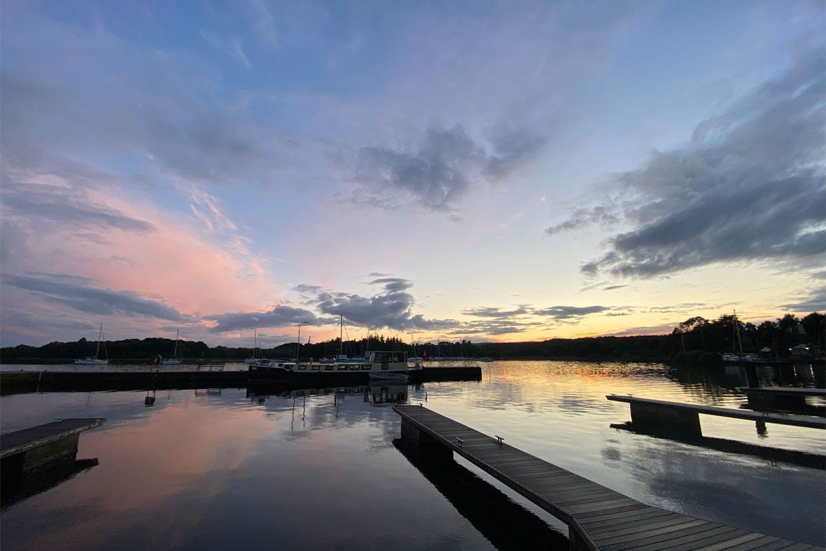 View over the pontoon and boats at sunset
