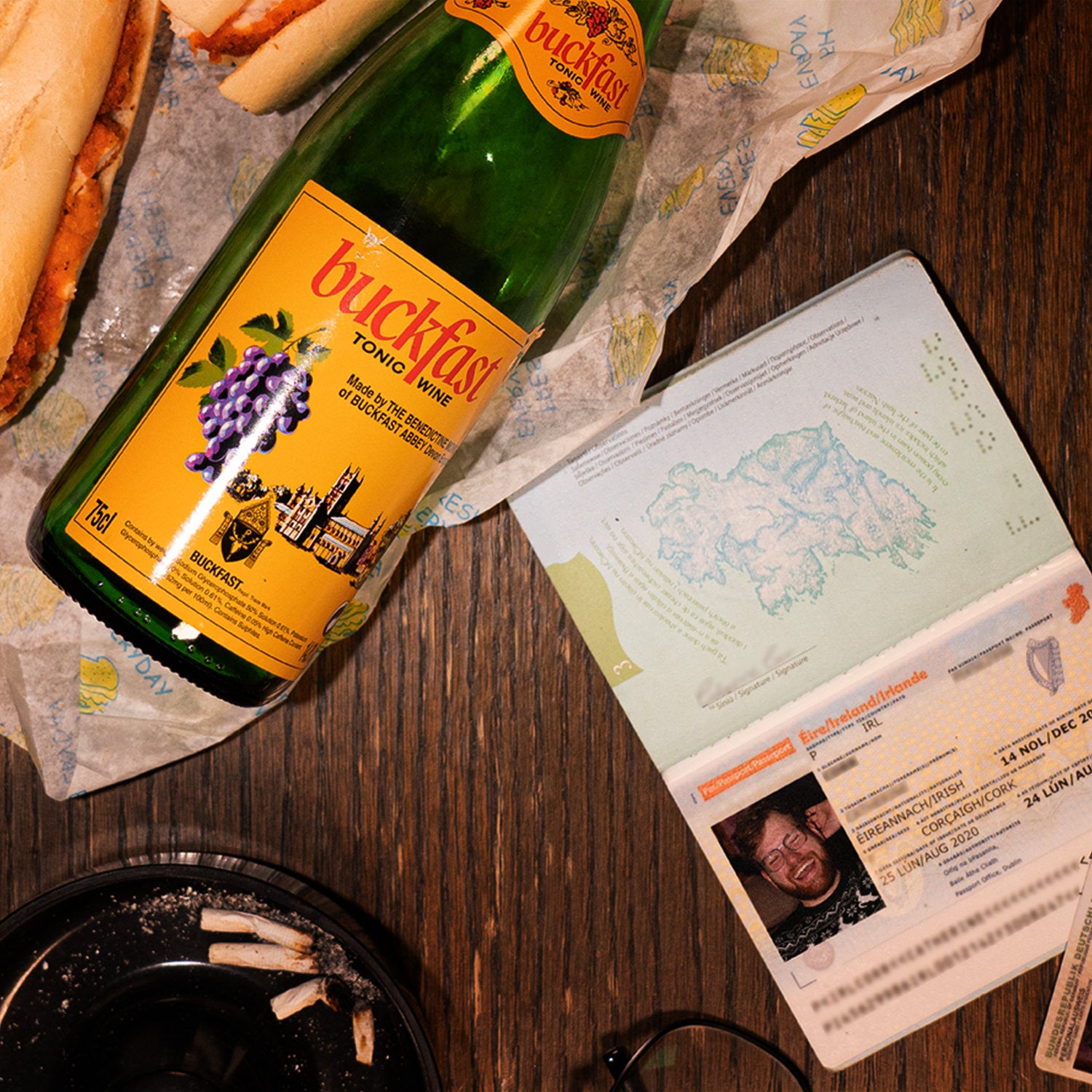 Bottle of Buckfast and an Irish passport