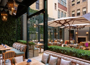 Outside dining area with tables and chairs