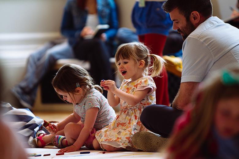 Image © Pimlico Project, 2 young girls are seated on a floor drawing