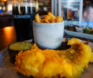 Fish and chips with a pint of Guinness