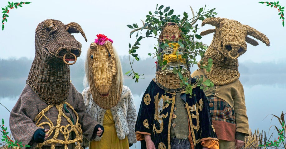 Armagh Christmas Rhymers at Dublinia - 4 people in rural costumes with heads covered by large wicker heads of animals