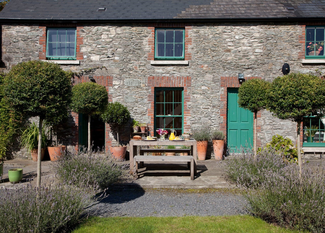 Front view of property with seating area