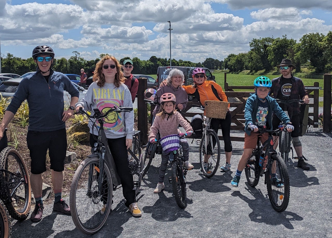 A family group about to set off and on a cycle tour