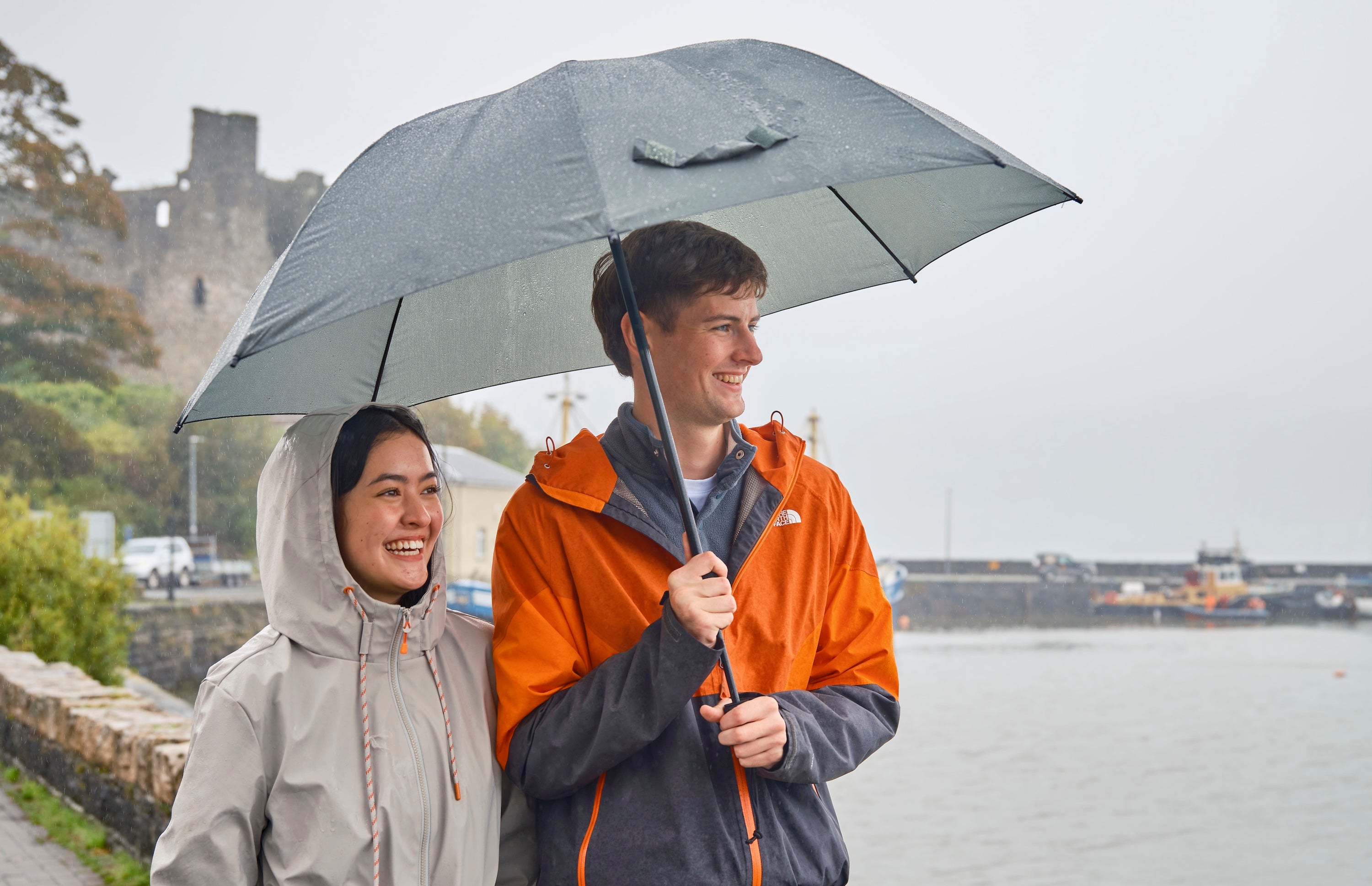 A couple in the rain in Carlingford, Co Louth