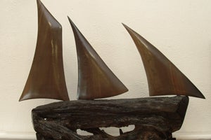 A sailboat carved from bogwood at Celtic Roots Studio, County Westmeath