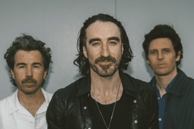 Band The Coronas, group of 3 slightly smiling men