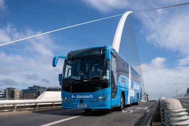 An Aircoach bus on the road