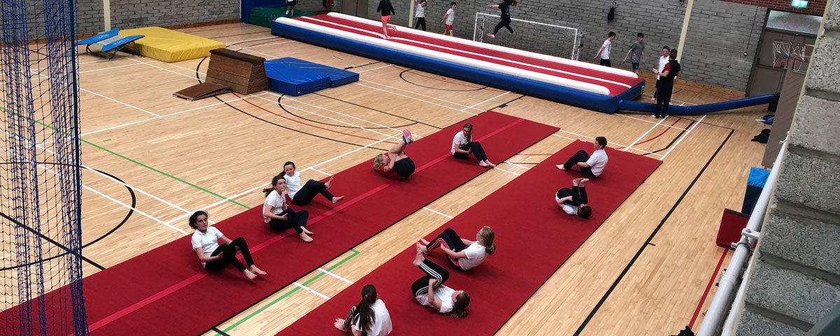 People exercising in a sports hall