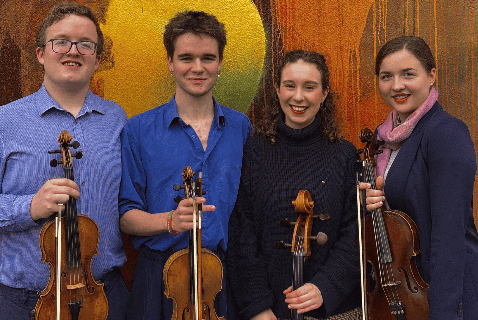 The members of the Meliora Quartet with their instruments.