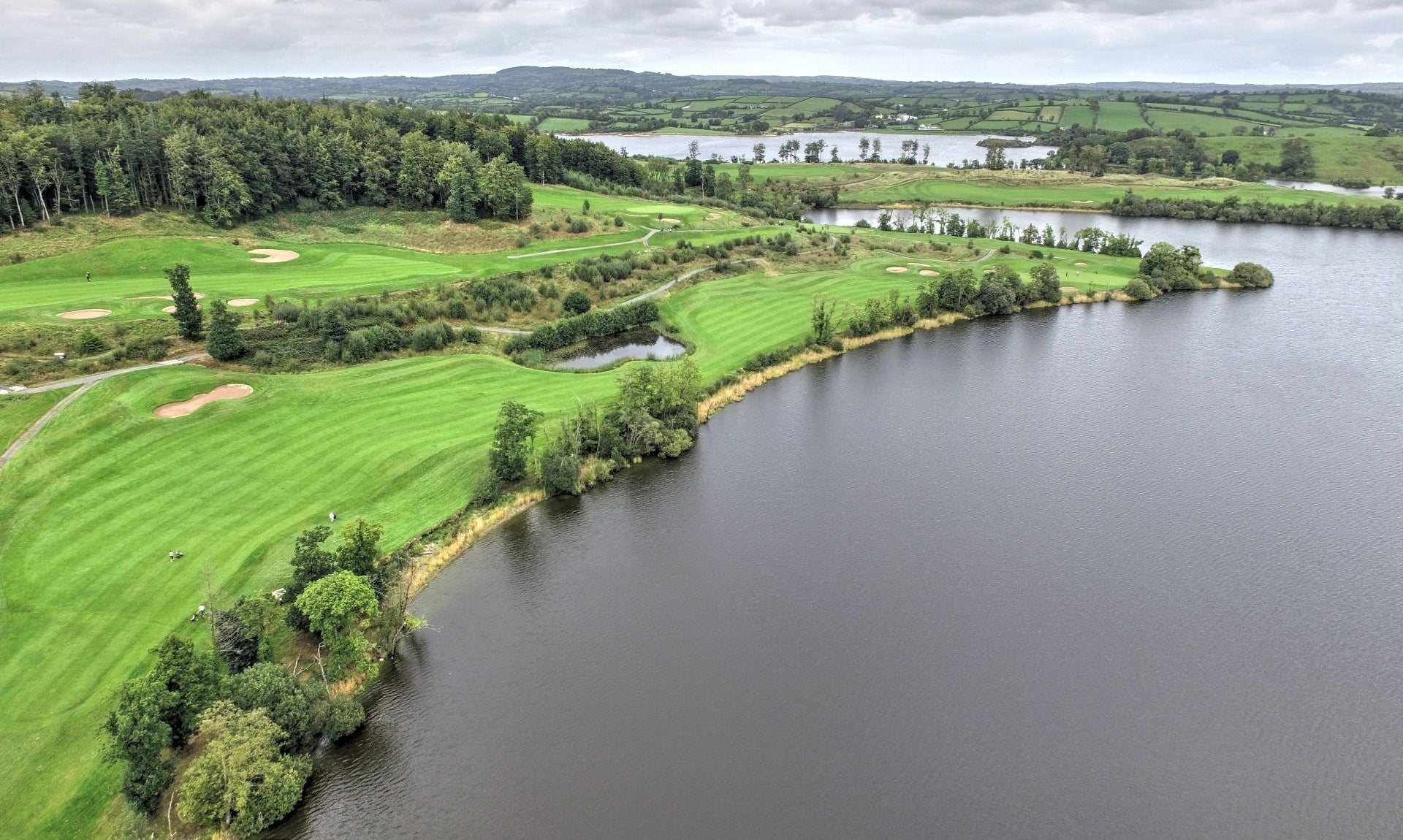 View of the lake and golf course at Concra Wood Golf and Country Club