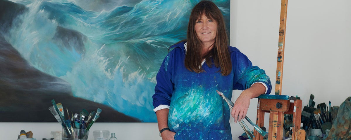 Carol Cronin artist in her gallery