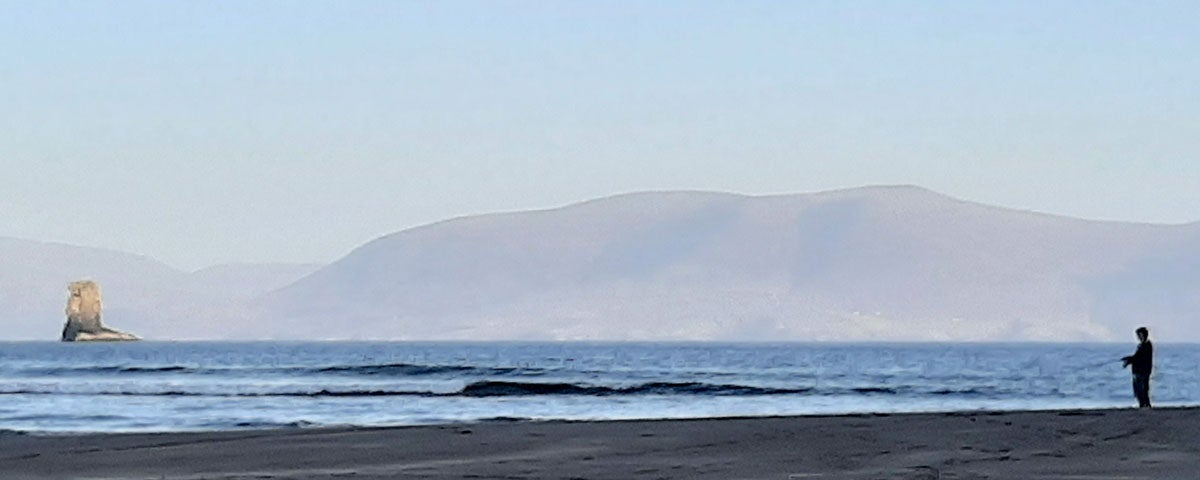 Man angling at Doonshean Beach