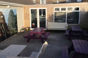 Outside seating area with benches.