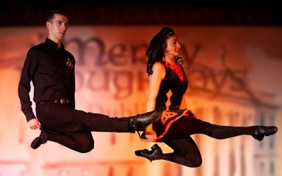 Two Irish dances appear to be suspended in mid air during a dance