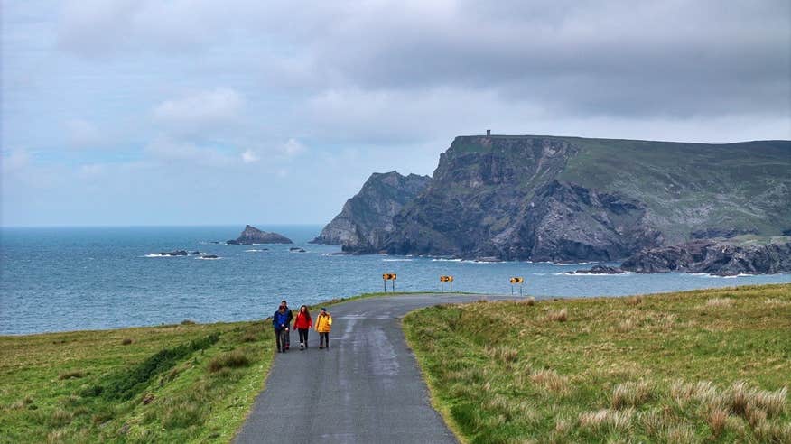 People walking the Rougey Cliff Walk in Co Donegal