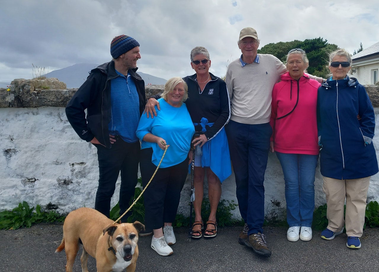 A group with their dog on tour with Really Great Tours