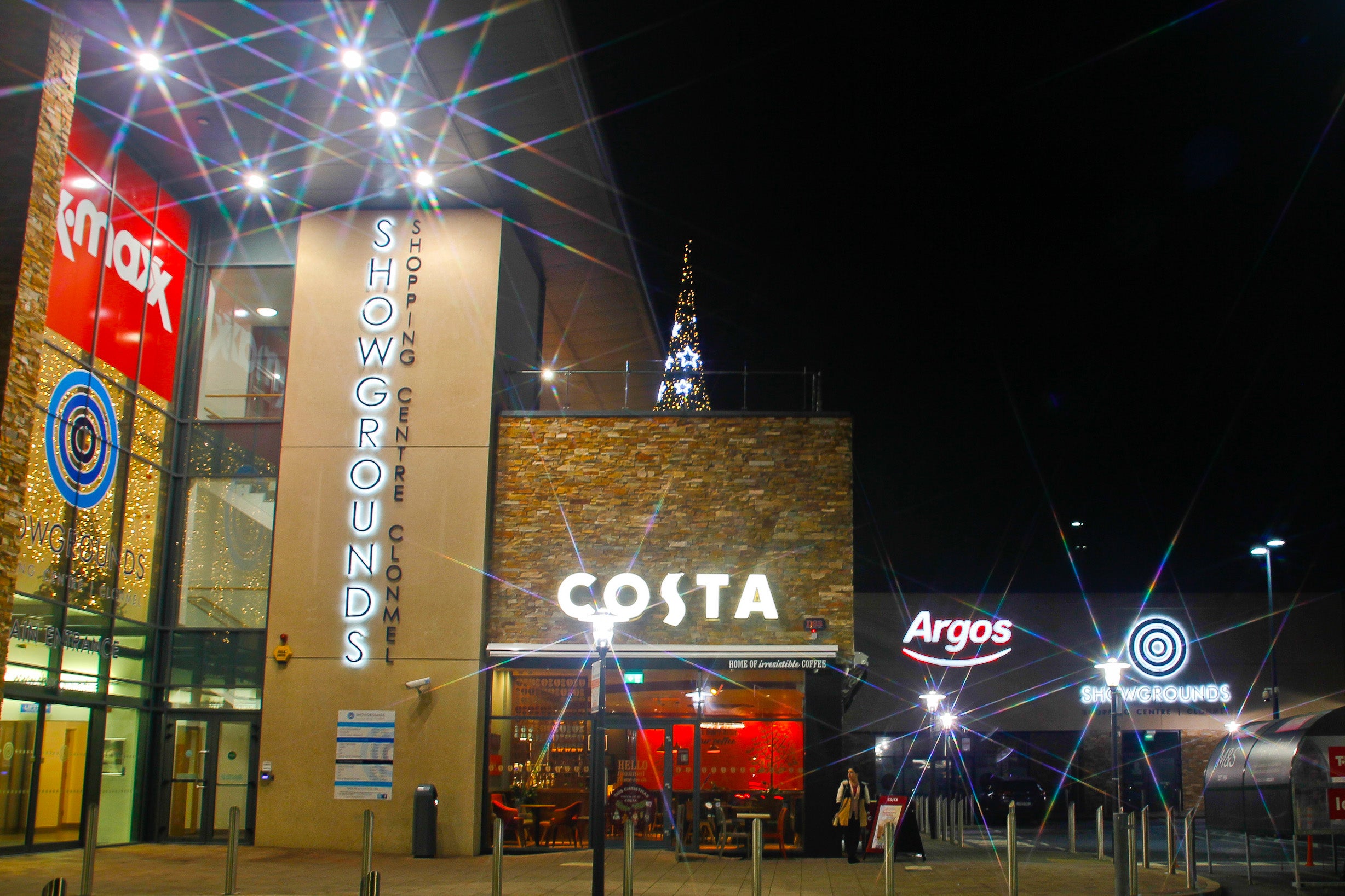 Shopping centre entrance after dark