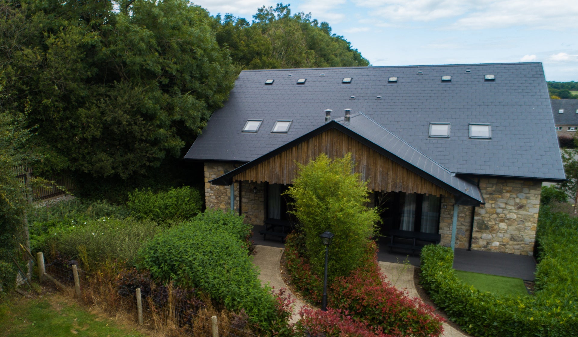 Exterior of accommodation on mature grounds.
