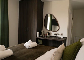 Bedroom with bed and seating area