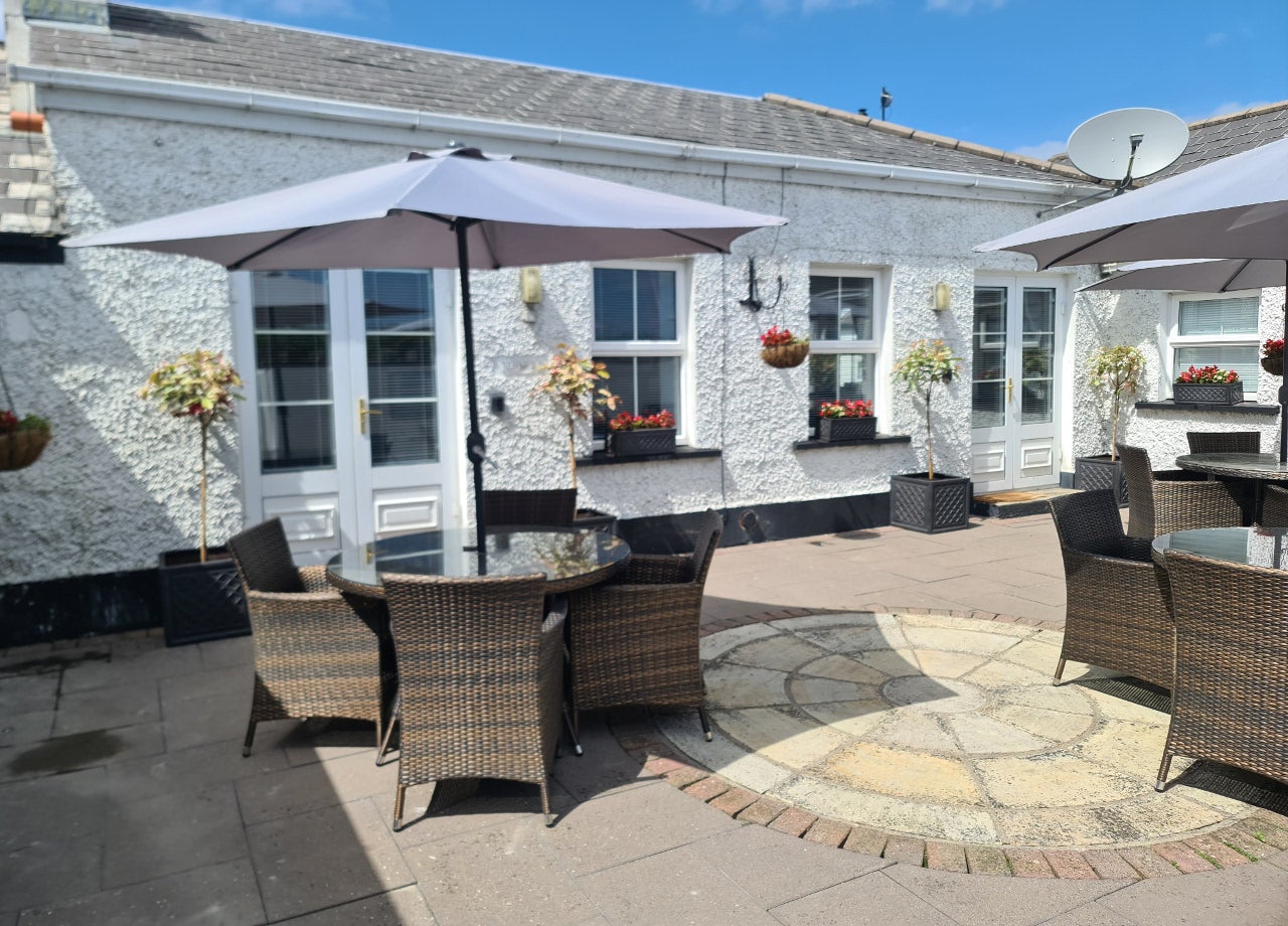 Outside seating area with table and chairs
