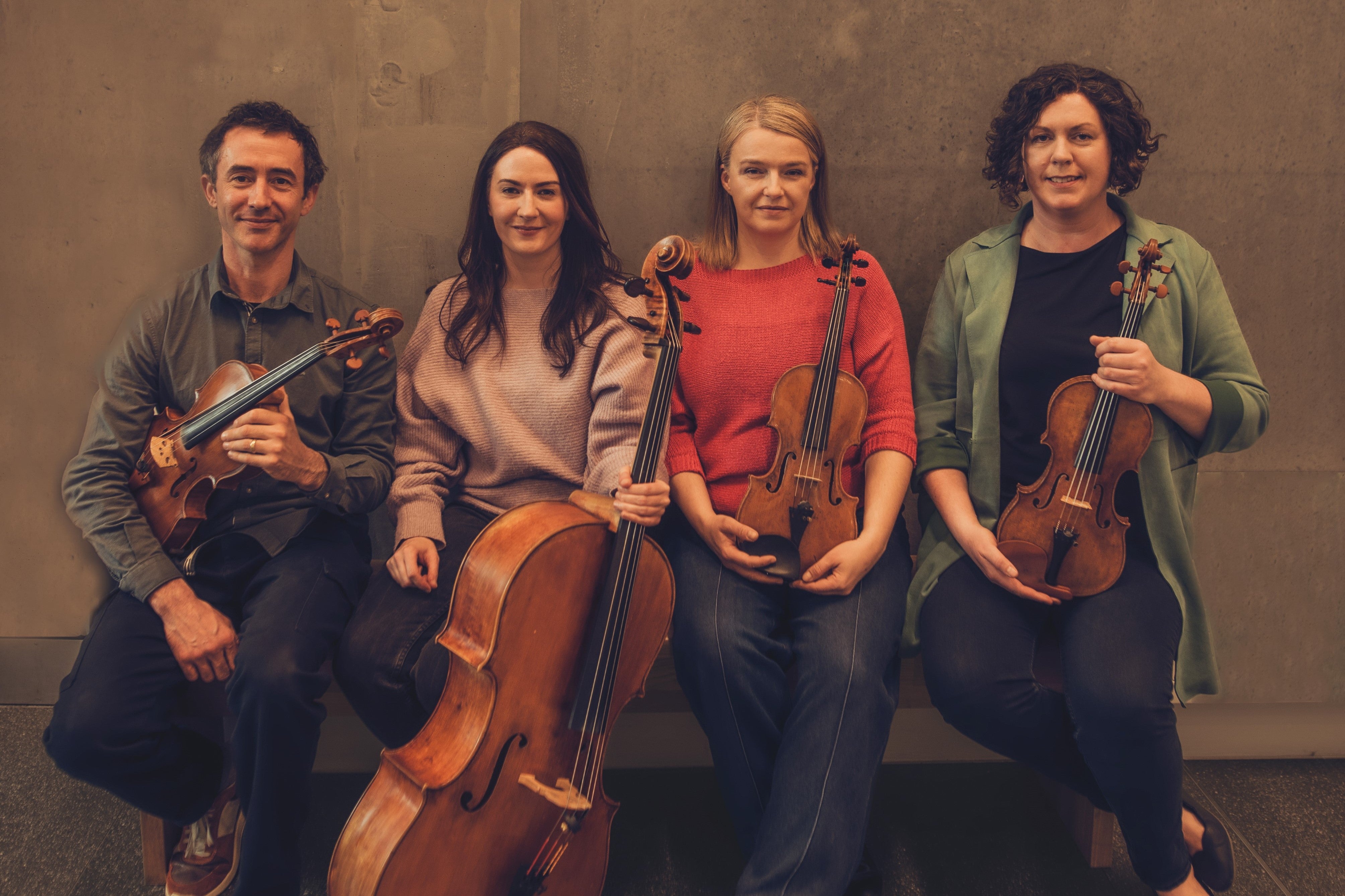 The members of the Banbha Quartet with their instruments.