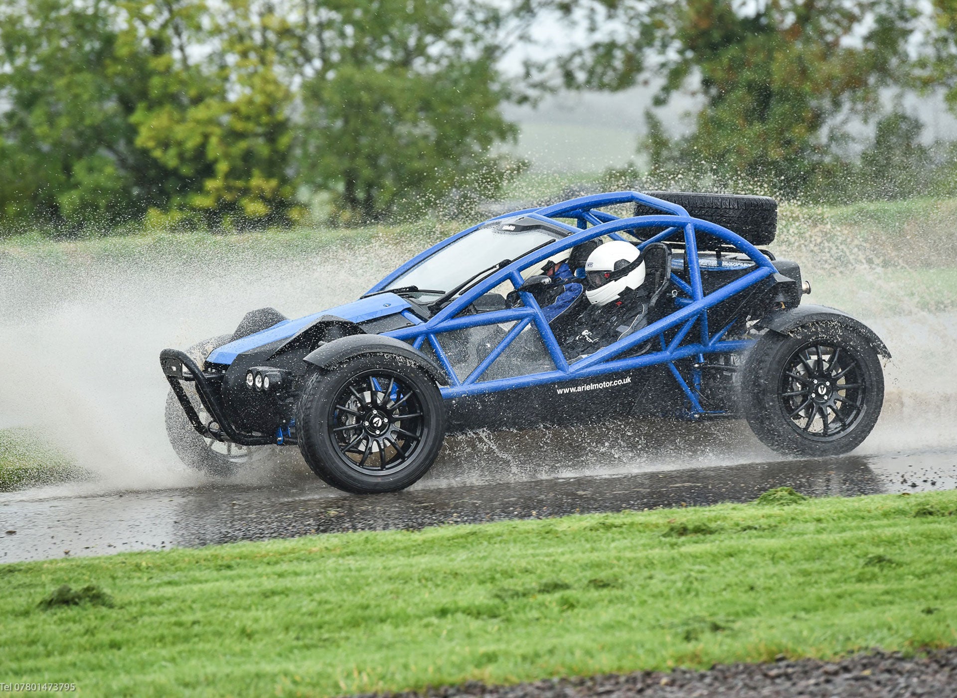 Rally School Ireland view of Ariel Nomad rally car splashing on the course