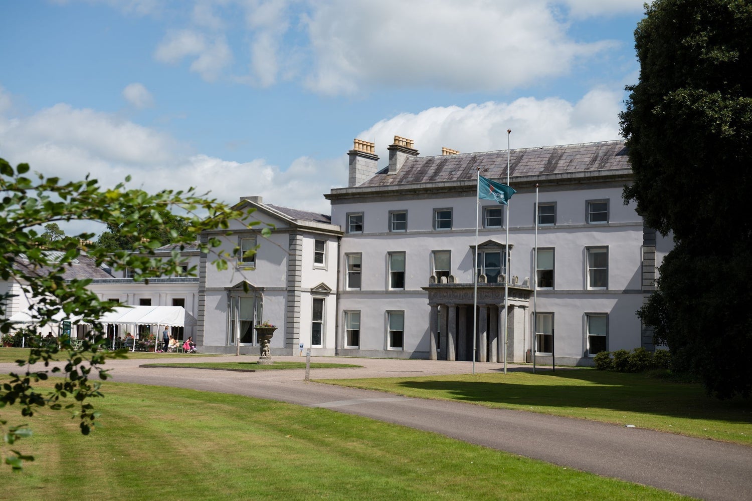 A large period house overlooking a well maintained lawn