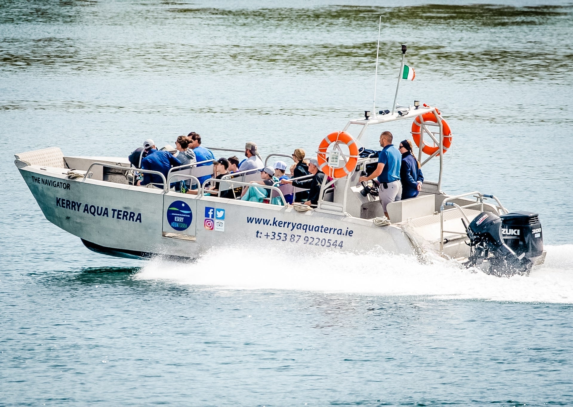 Group of people on a boat tour at sea with Kerry Aqua Terra