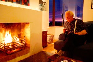 Image of Christy by open fire