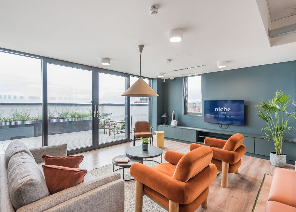 Seating area with couch and chairs 