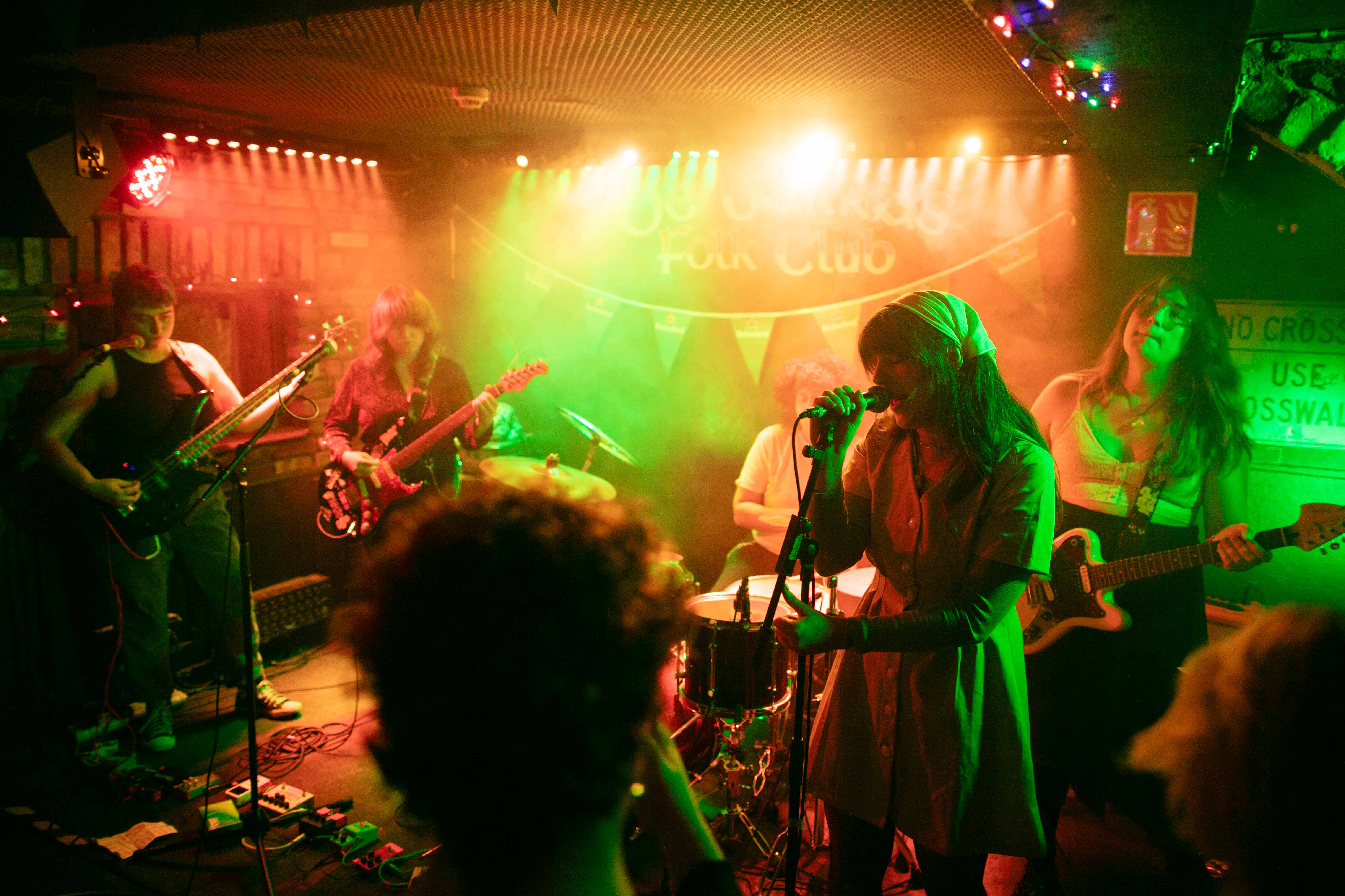 This is a picture of alternative rock band Girlfriend performing in DeBarras Folk Club as part of Clonakilty International Guitar Festival 2023