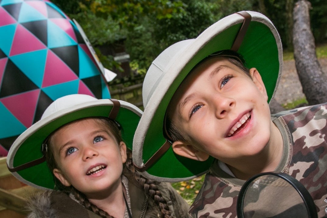 2 young children in explorer style hats