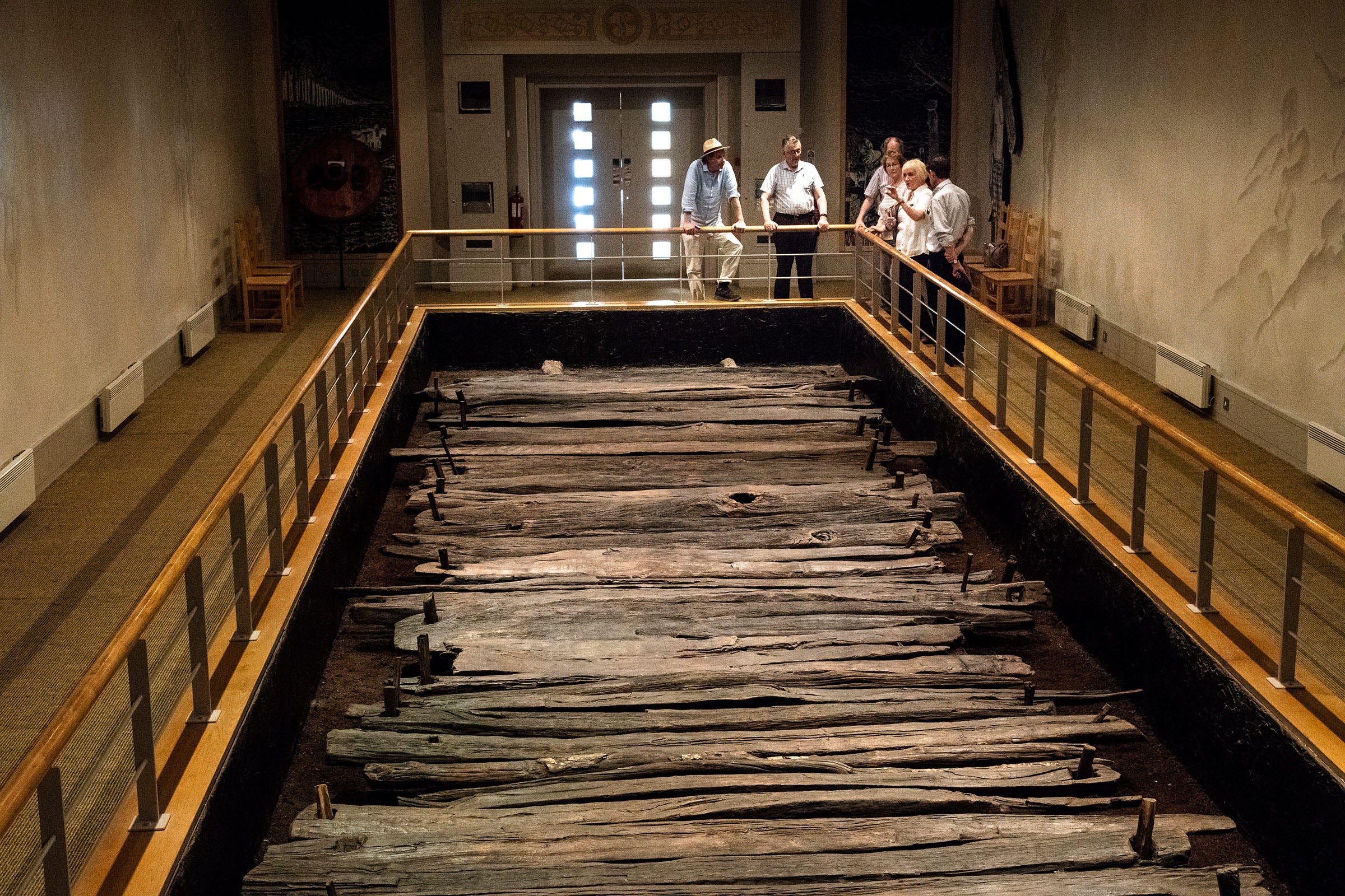 A group of people at a display at Corlea Trackway in County Longford.