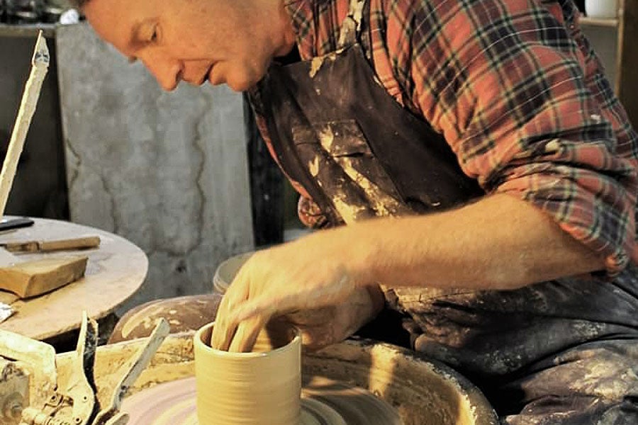 Benbulben Pottery showing Dave McLoughlin at the potters wheel