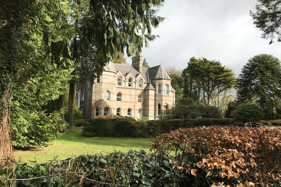 Front view of house and gardens