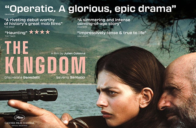 Cinema poster with text and a frowning woman looking through the sights of a rifle