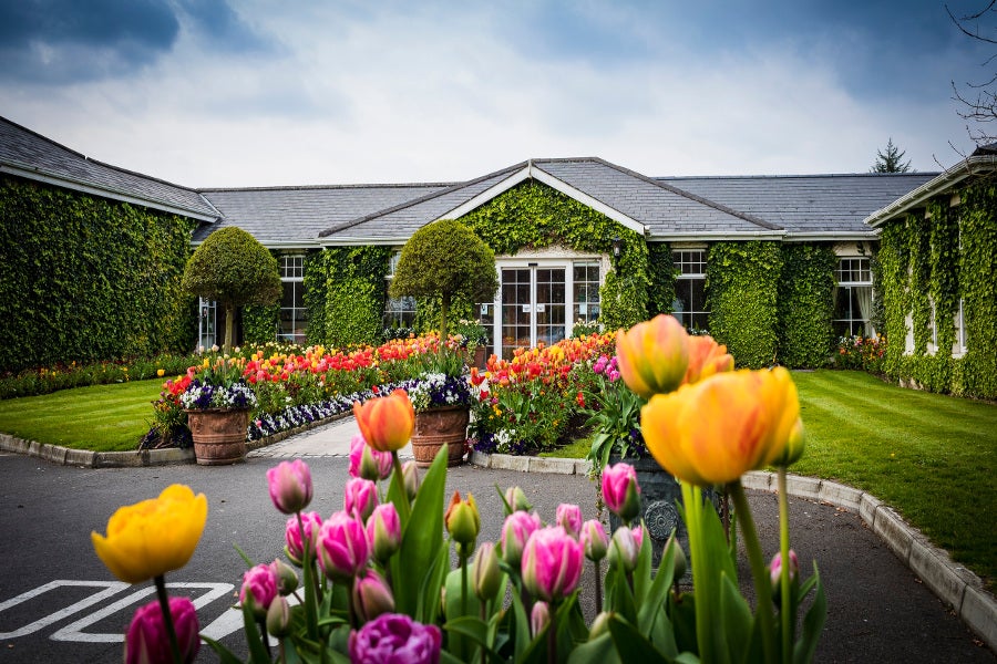 Exterior of hotelwith flower garden