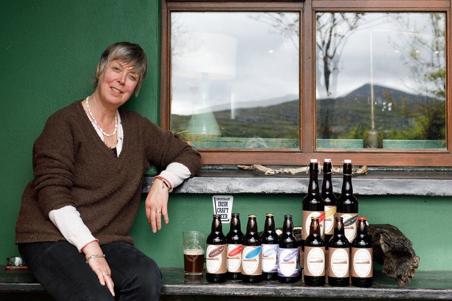 Adrienne Heslin with a display of crafted beers by West Kerry Brewery