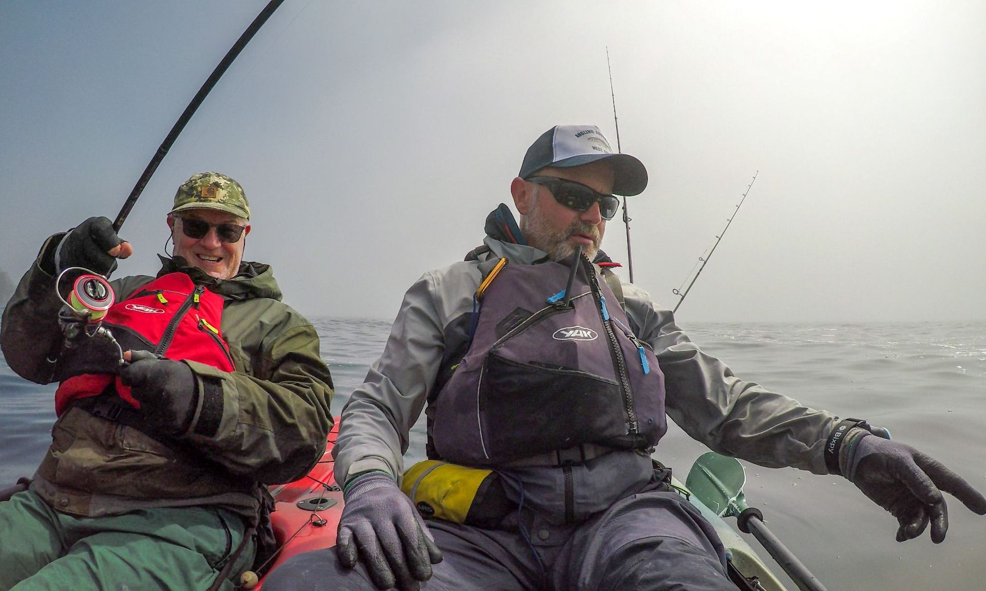 Two men out fishing with Angling Adventures West Cork