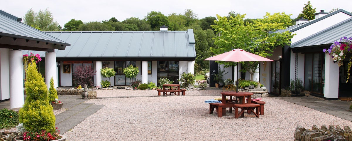 The landscaped courtyard with individual studios encircling it at the Donegal Craft Village