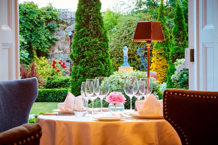 Orchids dining table overlooking the garden
