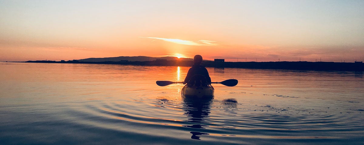 Canoe at sunset at Maghery Coastal Adventures County Donegal