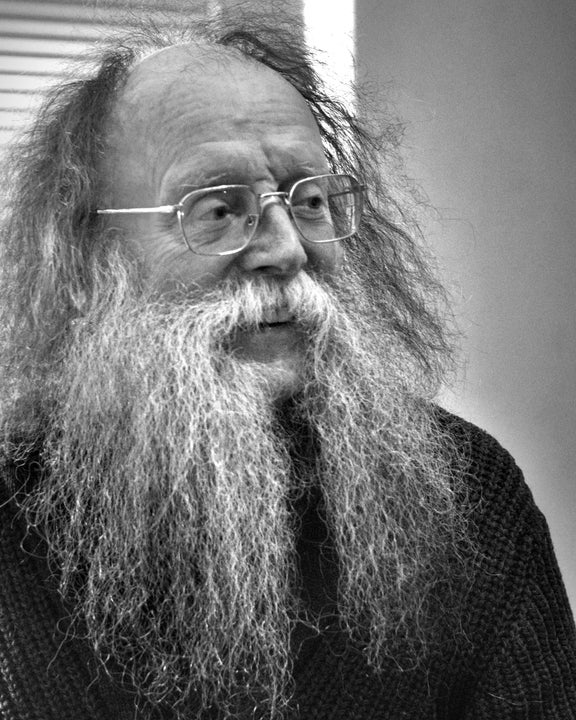Eddie Lenihan Irish author, storyteller, lecturer - an older man in glasses with long, fuzzy beard and hair.