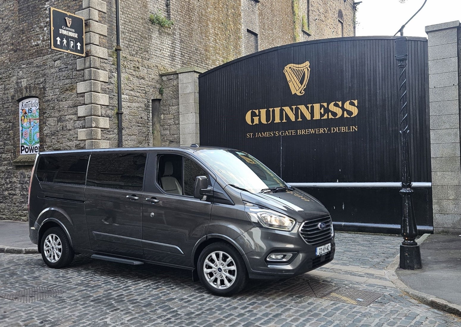 A luxury mini bus parked at the Guinness Storehouse gates