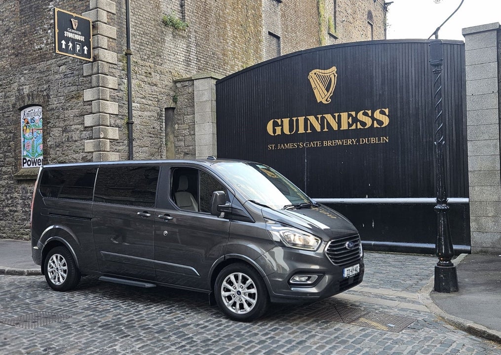 A luxury mini bus parked at the Guinness Storehouse gates
