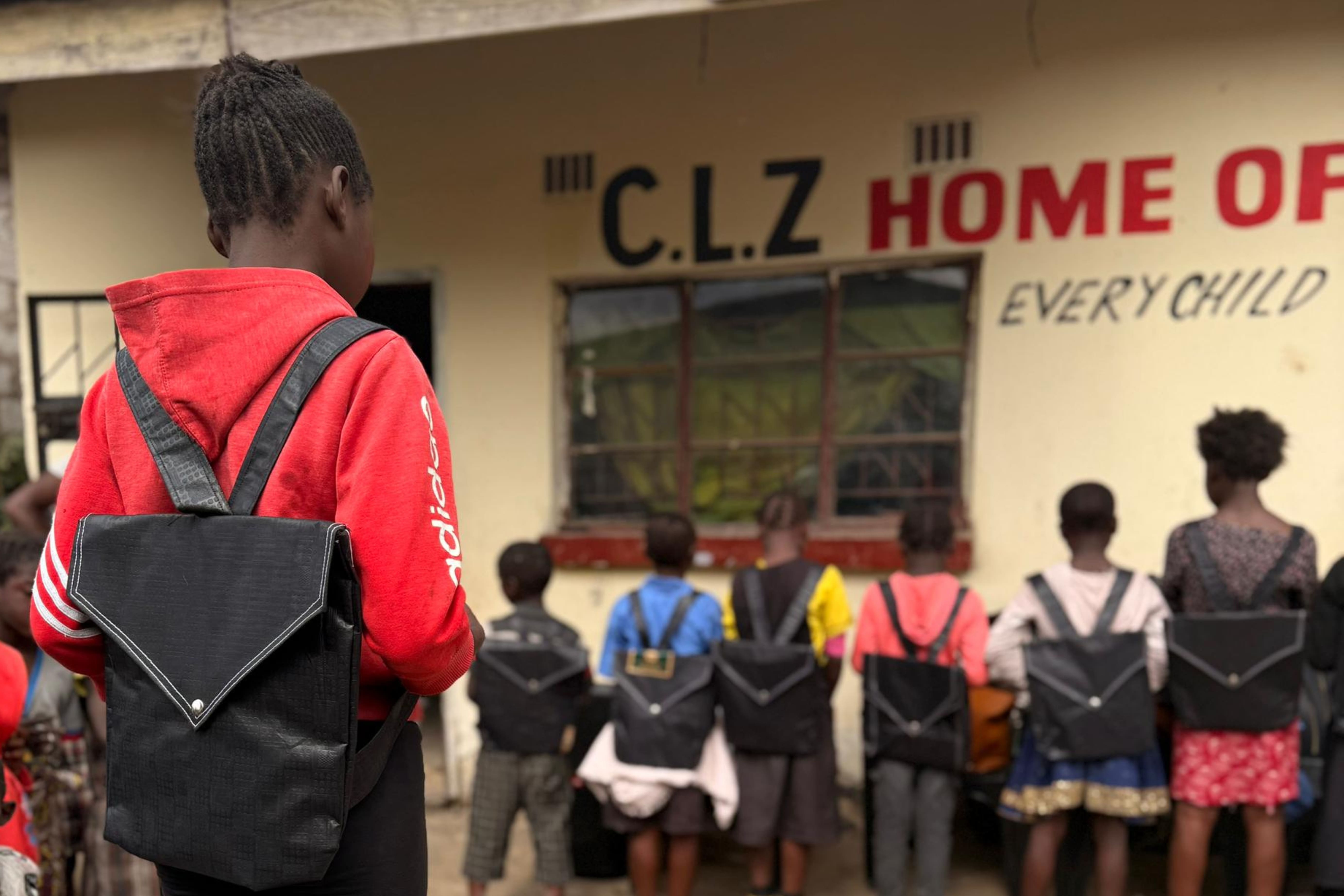 Image of girls with their backpacks