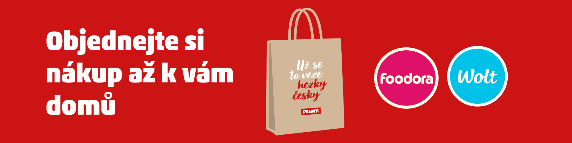 Banner propagující objednání nákupu domů přes aplikace Foodora a Wolt. Na obrázku je zobrazen nákupní taška s nápisem 'Už se to veze hezky česky' a logy aplikací Foodora a Wolt. Nad taškou je text 'Objednejte si nákup až k vám domů'.